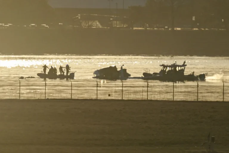 Medical officials conduct search and rescue operation on American Airlines plane in the water