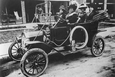 A photograph of Sarah Breedlove driving a car she was better known as Madam C.J. Walker the first woman to become a self made millionaire in the United States