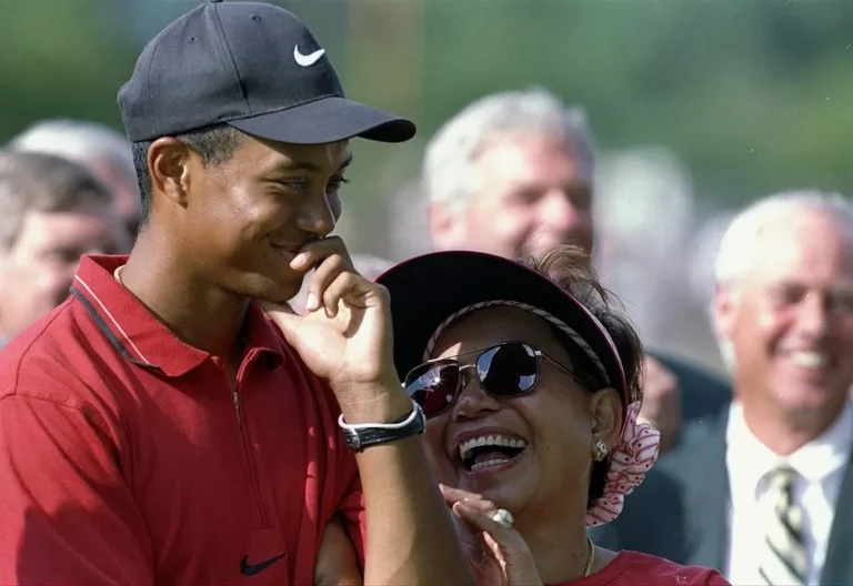 Tiger Woods smiles with his mother Kultida Woods