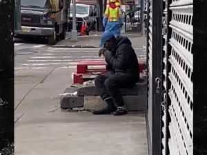 Man eats a rat