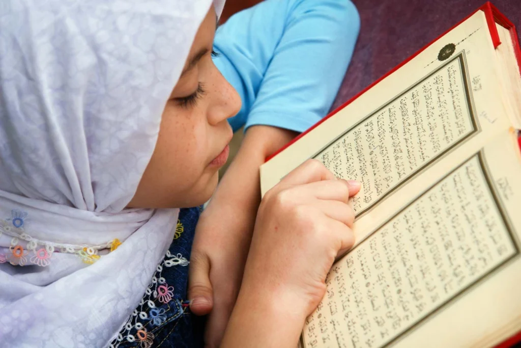 Muslim girl Quran