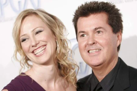 Simon Fuller and wife