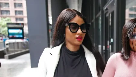 Supporters of singer R Kelly, Azriel Clary (R) and Joycelyn Savage (L)