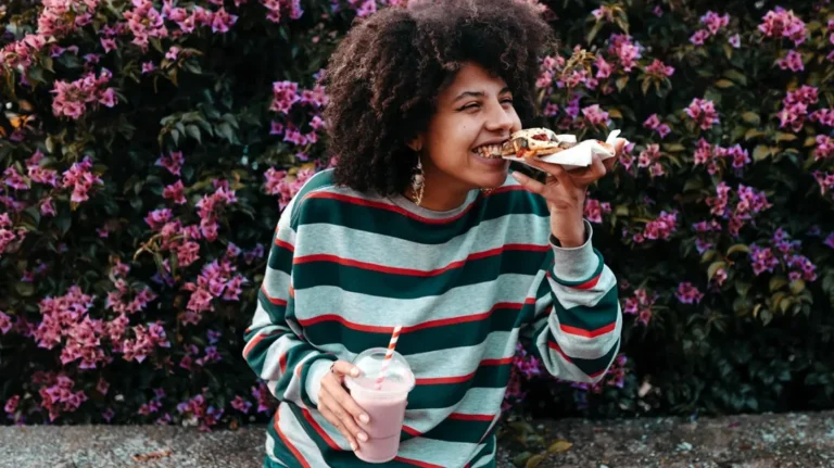 Woman-eating-pizza-header