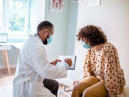 How Often Should You See Your Doctor for a Checkup? doctor-doing-a-medical-exam