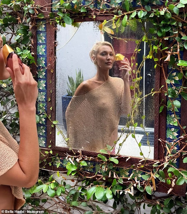 Bella Hadid Stuns in Sheer Look to Launch New Perfume 1 Bella Hadid