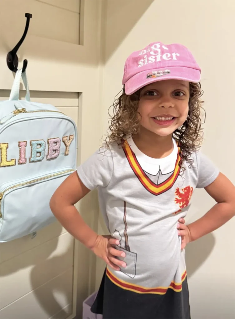 Cody and Brandis daughter Liberty wears a big sister hat