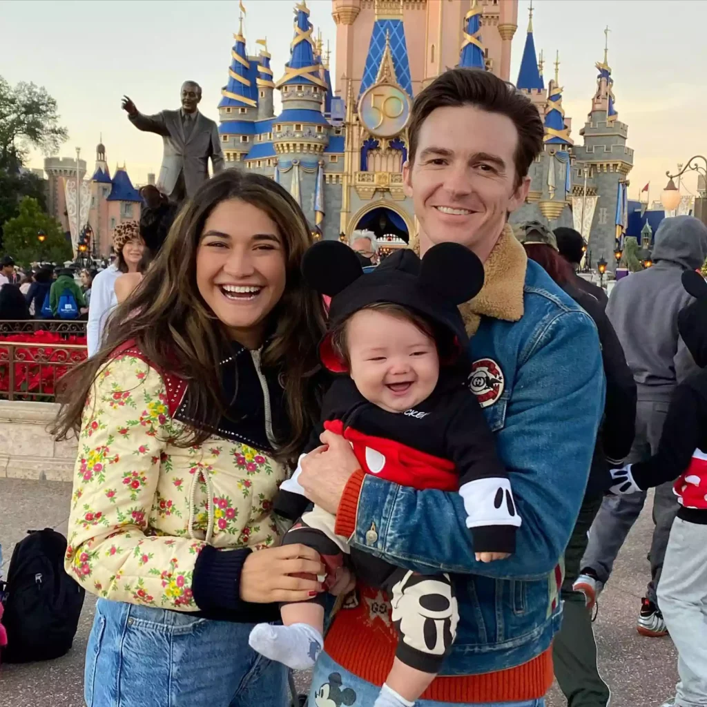 Drake Bell, Janet Von Schmeling, and their son enjoying a day at Disney World