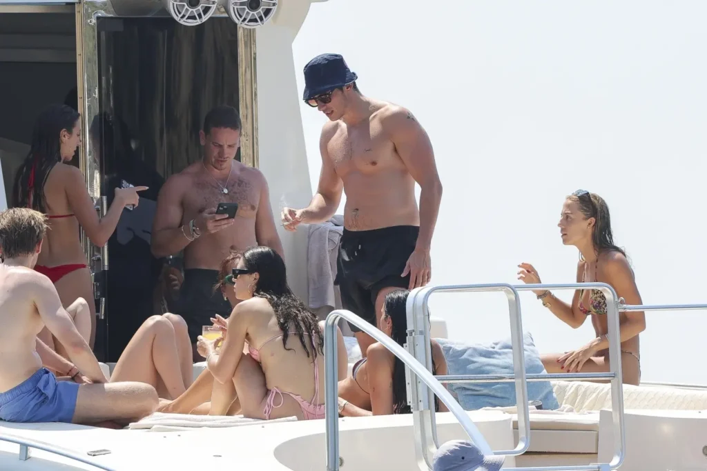 Dua Lipa and Callum Turner with friends in Ibiza