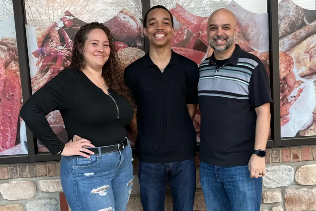 Teen Vanishes After Chilling “Help” Text to Mom 1 Giovanni Pelletier (center)
