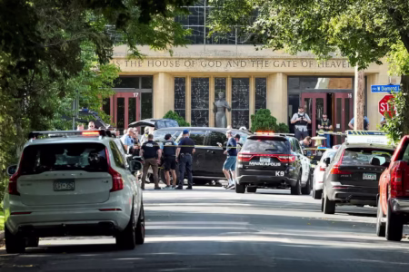 Shooter’s Mom Hires Lawyer After Minneapolis School Tragedy Law enforcement officers gather outside Annunciation Church following a mass shooting event