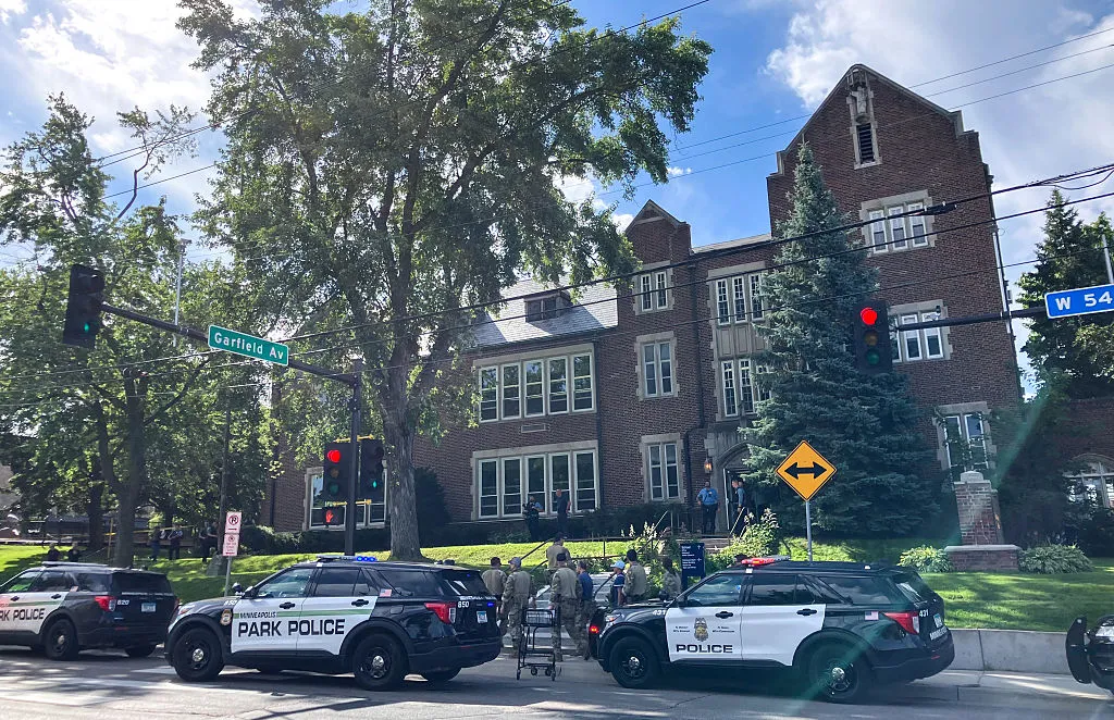 Minneapolis Catholic School Mass Shooting: Police Dispatch Audio Police and first responders work at the scene of a shooting near Annunciation Church and Catholic School in Minneapolis