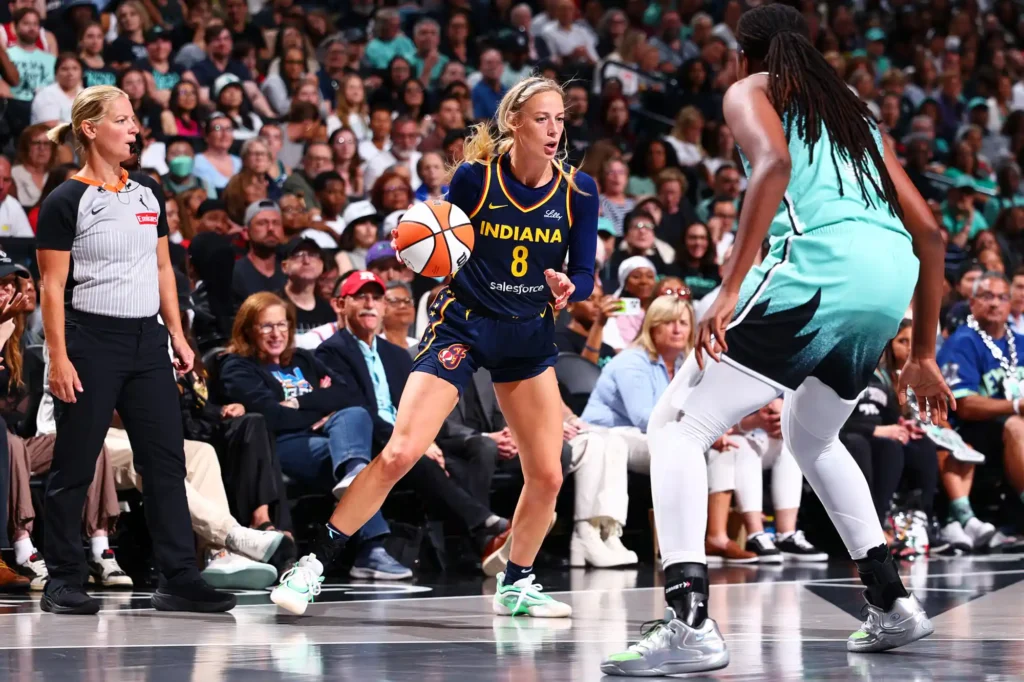Sophie Cunningham of the Indiana Fever drives to the basket during the game against the New York Liberty