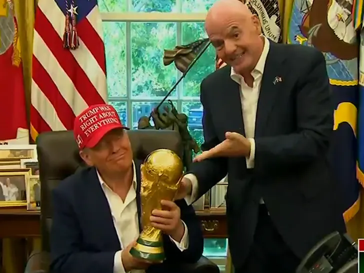 Trump World Cup Trophy in Oval Office Stunt