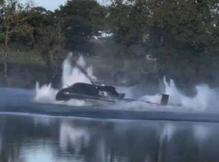 helicopter spins out of control above a lake in France
