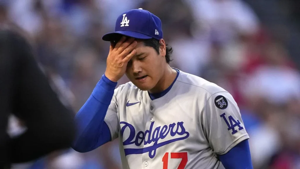 Angel Stadium Brawl: Fan Punched & Kicked in Head During Game mlb game descends into violent brawl as fan is knocked out cold