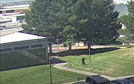 Charlie Kirk Shooter Caught on Camera Hobbling Toward Campus