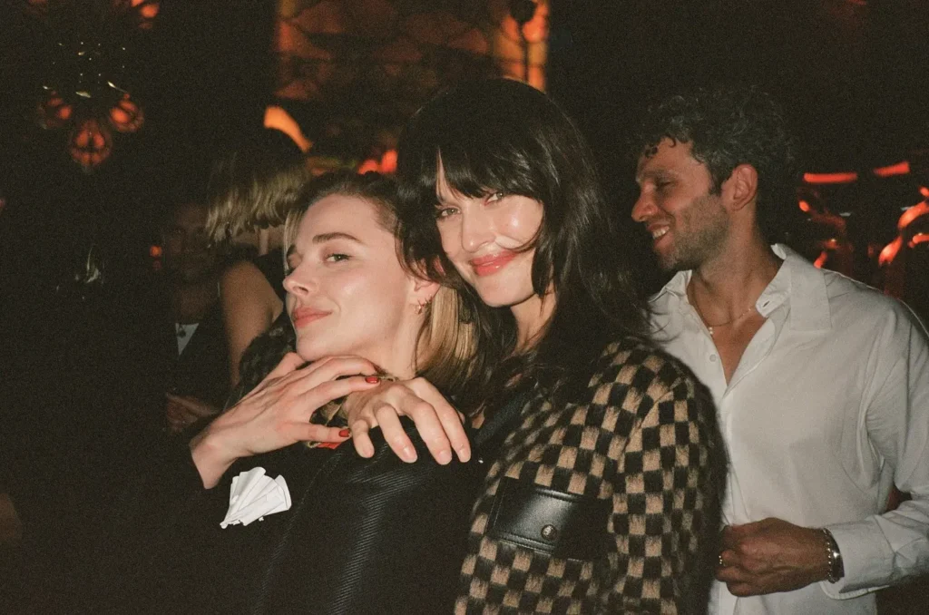 The model and the “Kick Ass” star wore gowns and after party looks designed by Louis Vuitton