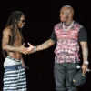 Lil Wayne (L) and Birdman perform in concert as part of Americas Most Wanted Tour at Austin360 Amphitheater