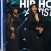 Nicki Minaj (R) and her mother Carol Maraj speak on stage at the 2015 BET Awards