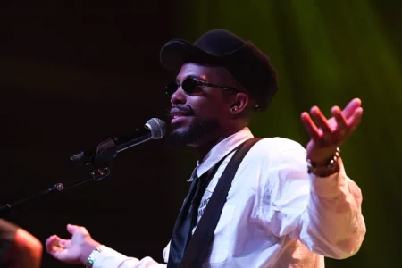 B.o.B. performs onstage during the Adventures Of Bobby Ray 15th Anniversary Tour at Buckhead Theatre