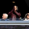 Cardi B acknowledges the crowd during the game between the Atlanta Falcons and the New England Patriots at Gillette Stadium