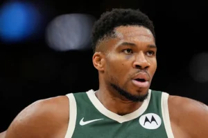 Giannis Antetokounmpo #34 of the Milwaukee Bucks reacts against the Sacramento Kings during the third quarter at Fiserv Forum