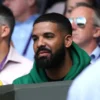 Drake in the stands of centre court watching Serena Williams in action on day eight of the Wimbledon Championships at the All England Lawn Tennis and Croquet Club, Wimbledon.