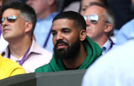 Drake in the stands of centre court watching Serena Williams in action on day eight of the Wimbledon Championships at the All England Lawn Tennis and Croquet Club, Wimbledon.