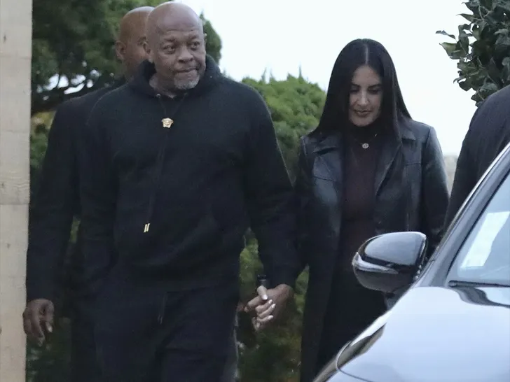 Dr. Dre And Michelle Holding Hands