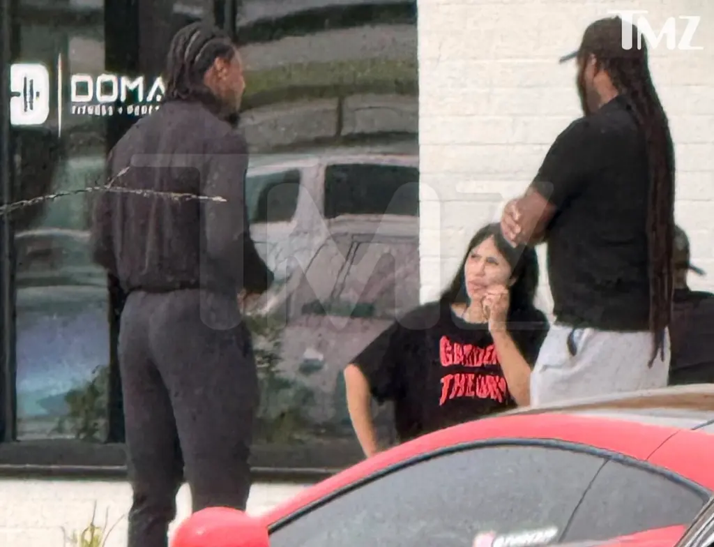 At one point, things became so tense that a man with Cardi reached out to put a hand on the rapper’s shoulder to calm her down.