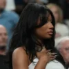 Megan Thee Stallion attends a preseason game between the Dallas Mavericks and the Los Angeles Lakers at T Mobile Arena