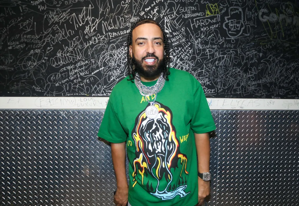 French Montana poses for a picture at LIV nightclub