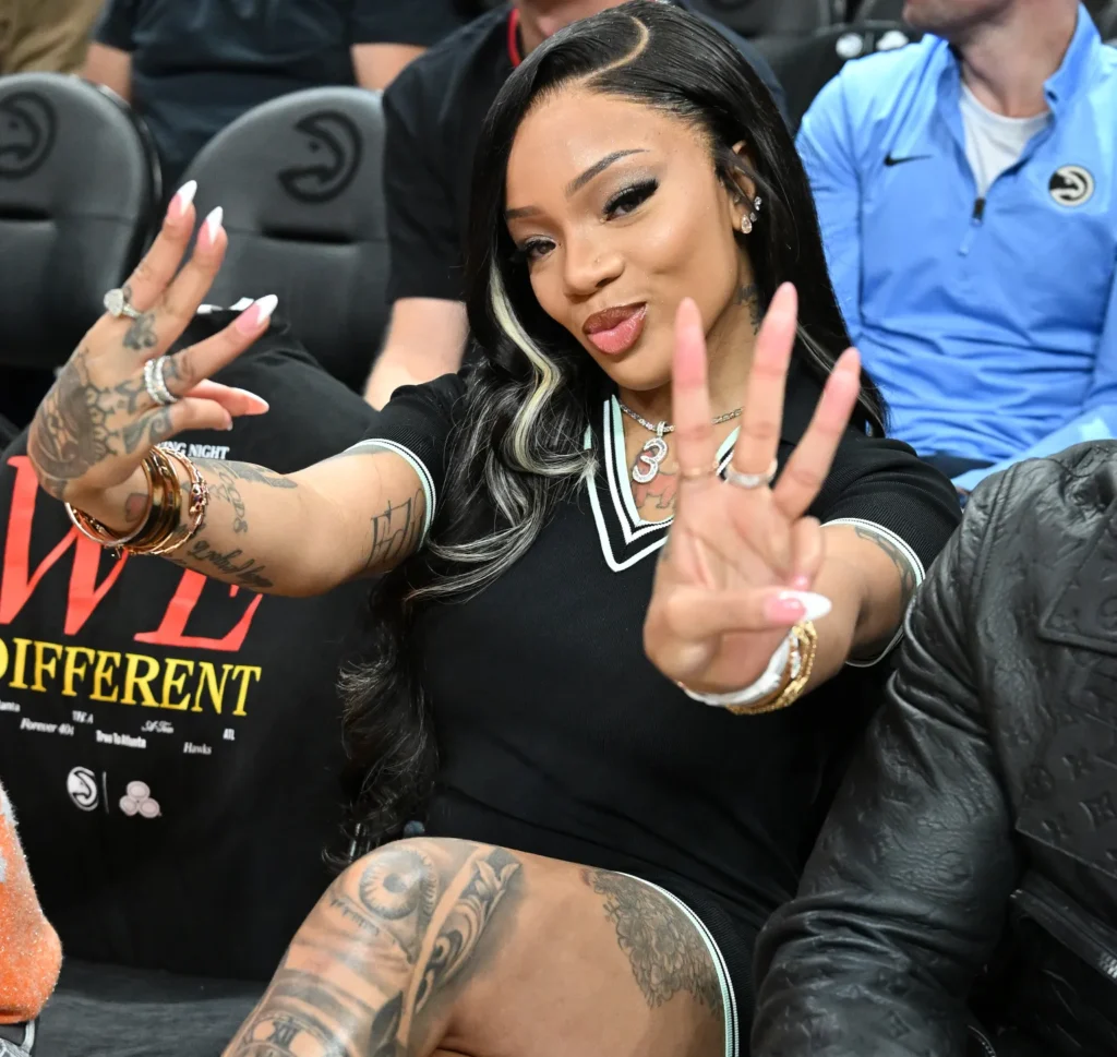 GloRilla attends the game between the Toronto Raptors and the Atlanta Hawks at State Farm Arena