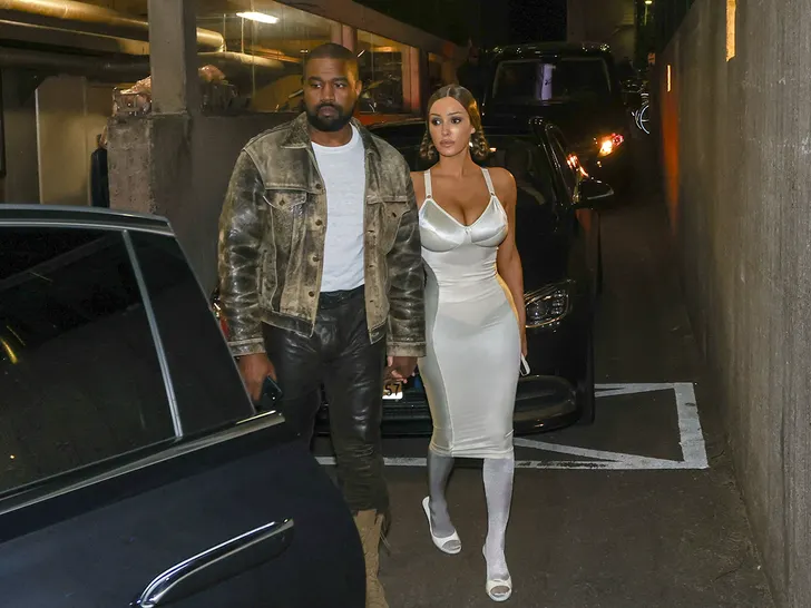 Kanye West and Bianca Censori Surprise Fans With Rare PDA Moment 2 Kanye West and Bianca Censori Captured in Rare Smiling Moment in Amsterdam