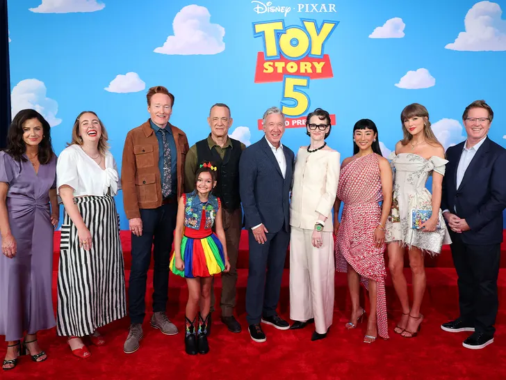 Taylor Swift Stuns In Wedding Inspired Dress at Toy Story 5 Premiere
