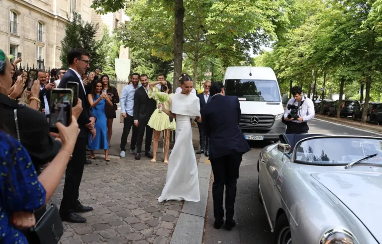 Thylane Blondeau steps into a dreamy exit... the light swing mini dress and polished oxford shoes keep guests crisp.