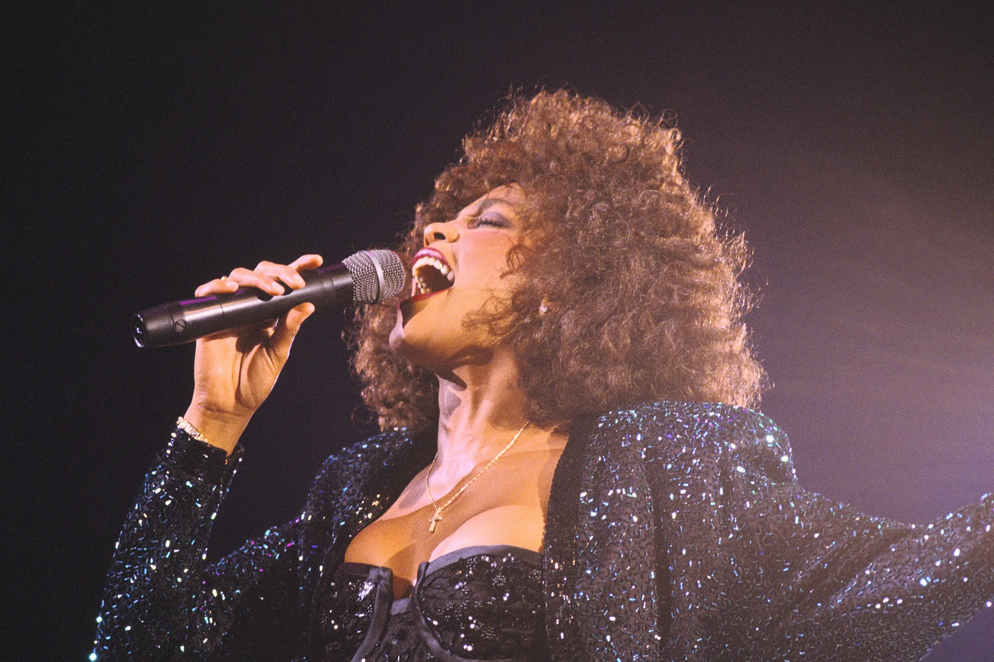 Whitney Houston took the stage to serenade audiences for a concert in Paris, France on May 18, 1988.