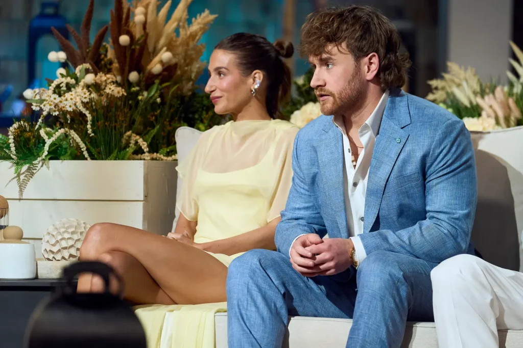 Wilson eventually listened to his co stars and left the stage to console Batula (both pictured above during the reunion)