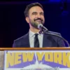 Zohran Mamdani speaks during a New York is Not For Sale rally at Forest Hills Stadium