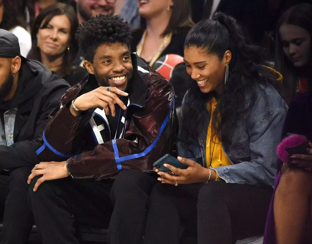 Chadwick Boseman and Taylor Simone Ledward attend the 69th NBA All Star Game on February 16, 2020 in Chicago, Illinois.