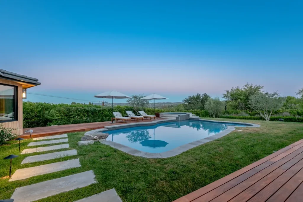Designer Betsey Johnson Lists Hidden Hills Home pool side