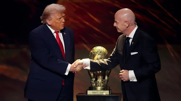 Donald Trump Reacts After FIFA Reverses Folarin Balogun Ban Gianni Infantino, President of FIFA, shakes hands with U.S. President Donald Trump as he receives the FIFA Peace Prize during the FIFA World Cup 2026 Official Draw