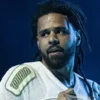 J. Cole performs onstage during the 2025 Dreamville Music Festival at Dorothea Dix Park on April 6, 2025 in Raleigh, North Carolina