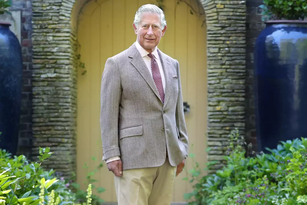 King Charles Reunites With Prince Harry, Meghan and Kids at Private Visit 7 King Charles stands outside Highgrove House in 2019.