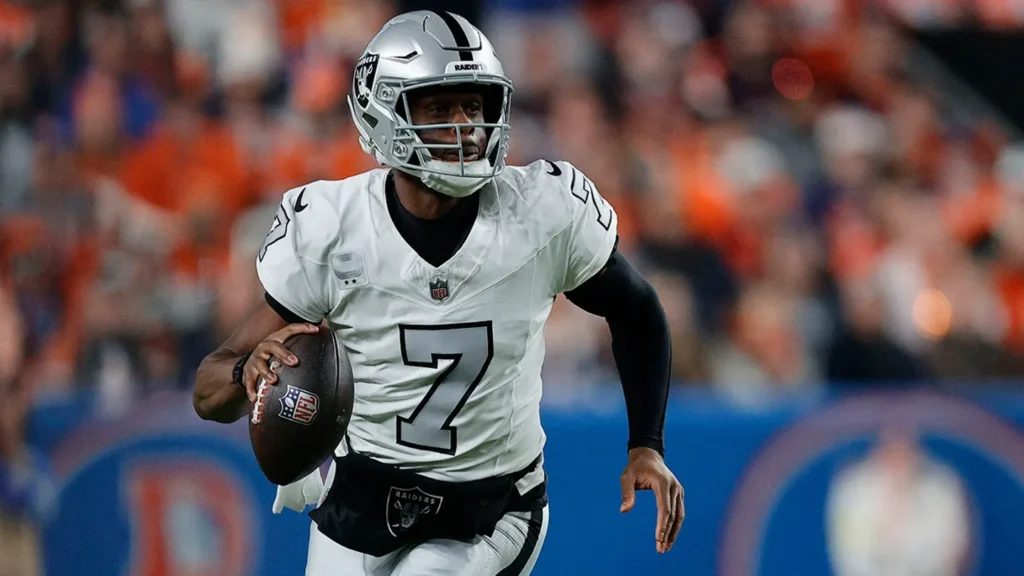Las Vegas Raiders quarterback Geno Smith drops back to pass against the Denver Broncos during the first half at Empower Field at Mile High Nov. 6, 2025 in Denver, Colo.