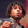 NBA YoungBoy performs onstage during the MASA TOUR at State Farm Arena on October 15, 2025 in Atlanta, Georgia.