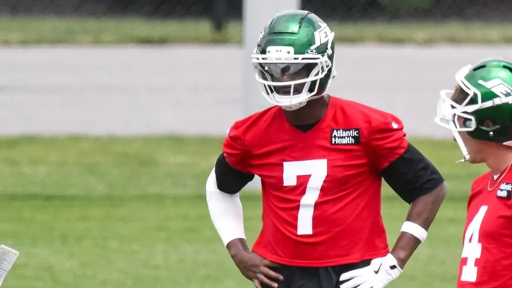 New York Jets quarterbacks Geno Smith and Brady Cook participate in a drill during minicamp at Atlantic Health Jets Training Center in Florham Park, N.J., June 10, 2026