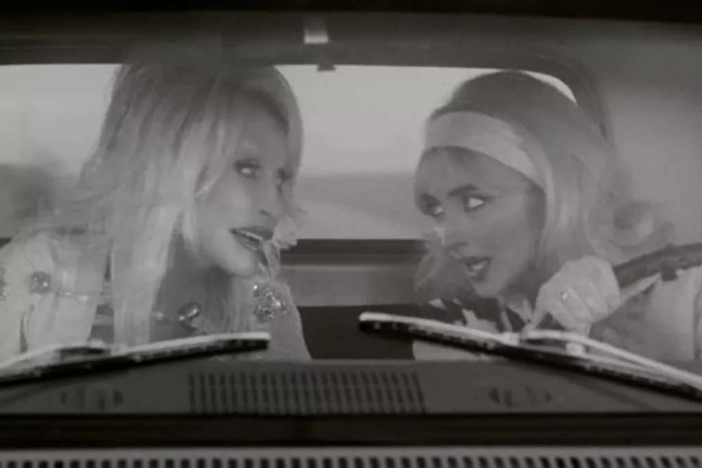 Dolly Parton and Sabrina Carpenter in Please Please Please music video.