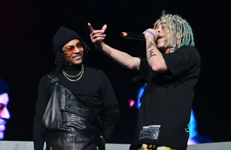 T.I.’s Sons’ Parking Lesson Nearly Turns Into a Disaster T.I. and King Harris perform onstage during 2023 V 103 Winterfest Celebrating 50 Years of Hip Hop at State Farm Arena on December 15, 2023 in Atlanta, Georgia.